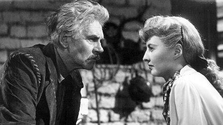 Walter Huston e Barbara Stanwyck em Almas em Fúria