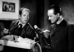 Pierre Larquey e Pierre Fresnay em O Assassino Mora no 21