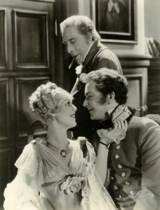 Arliss, Loretta Yong e Robert Yong em uma cena de A Casa de Rotschild