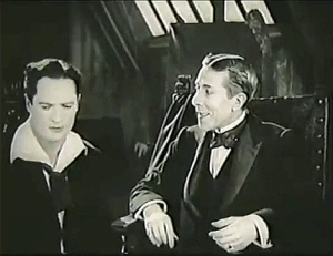 Edmund Lowe e George Arliss em The Devil