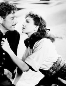 Ronald Colman e Claudette Colbert em Sob Duas Bandeiras
