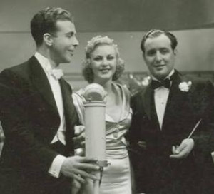 Dick Powell, Ginger Rogers e Ted Fio Rito em Vinte Milhões de Namoradas