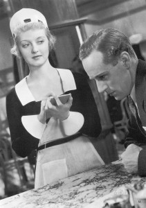 Bette Davis e Leslie Howard em Escravos do Desejo