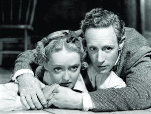 Bette Davis e Leslie Howard em A Floresta Petrificada