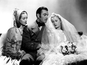 Bette Davis, George Brent e Miriam Hopkins em Eu Soube Amar
