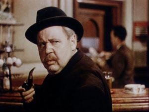 Charles Laughton como Maigret